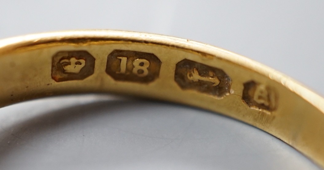 A late Victorian 18ct gold an claw set solitaire diamond ring, size Q, gross weight 5.2 grams.